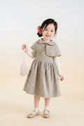Girls houndstooth cape dress set - front view